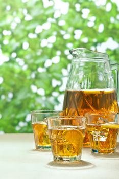 Iced Lemon Ice Tea in on a table in summer