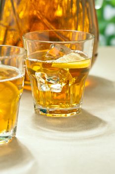 Iced Lemon Ice Tea in on a table in summer