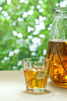 Iced Lemon Ice Tea in on a table in summer