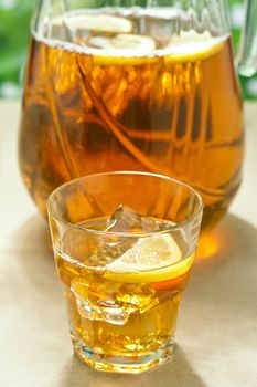 Iced Lemon Ice Tea in on a table in summer