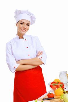 Young cook preparing food from fresh vegetables