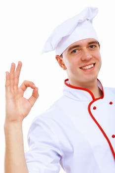 Young cook preparing food wearing a red apron