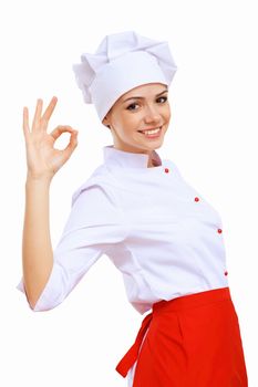 Young cook preparing food wearing a red apron