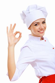 Young cook preparing food wearing a red apron