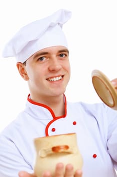 Young cook preparing food wearing a red apron