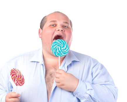 Fat Man in a Blue Shirt, Eating a Lollipop, isolated