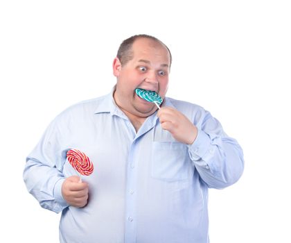 Fat Man in a Blue Shirt, Eating a Lollipop, isolated