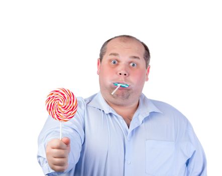 Fat Man in a Blue Shirt, Eating a Lollipop, isolated
