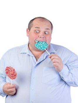 Fat Man in a Blue Shirt, Eating a Lollipop, isolated