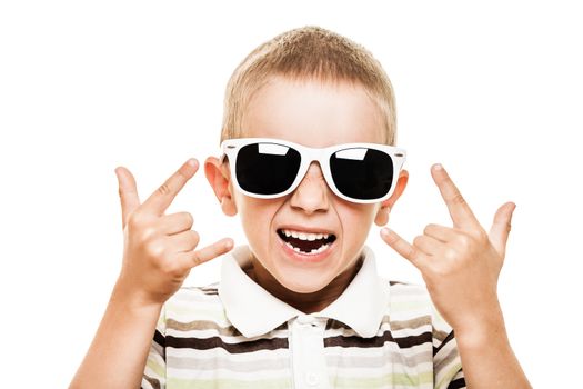 Beauty smiling child boy in sunglasses gesturing white isolated