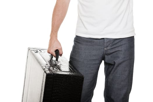 Man in casual clothing hand holding large travel luggage suitcase white isolated