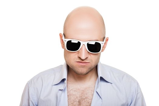 Cool smiling bald or shaved head man in sunglasses white isolated