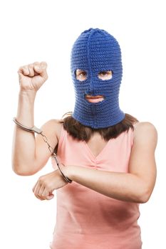 Russian protest movement concept - woman wearing balaclava or mask on head showing handcuffs on hands white isolated