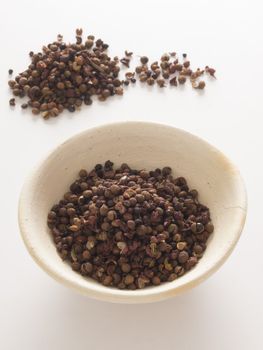 close up of a bowl of szechuan pepper