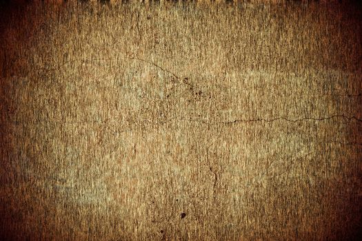 old dirty cracked grungy background texture in brown 