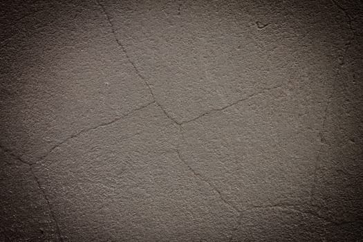 Vintage grey painted plaster wall background. Dark edged