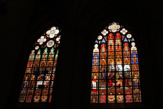 Beautiful stained glass window in the Brussels cathedral isolated on black