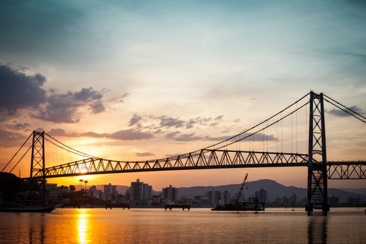 The Hercilio Luz Bridge, in Florianopolis, Brazil, with an amazing sunset.