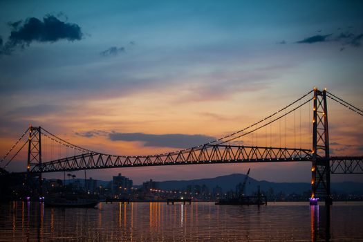 The Hercilio Luz Bridge, in Florianopolis, Brazil, with an amazing sunset.