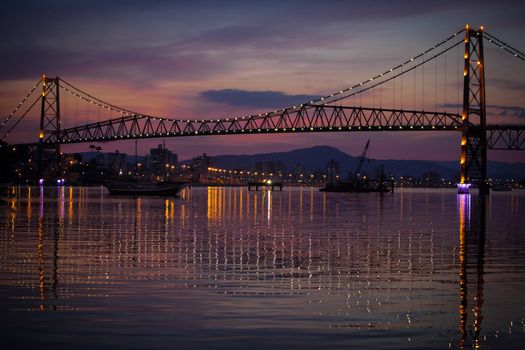 The Hercilio Luz Bridge, in Florianopolis, Brazil, with an amazing sunset.