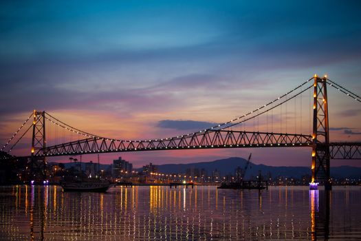 The Hercilio Luz Bridge, in Florianopolis, Brazil, with an amazing sunset.