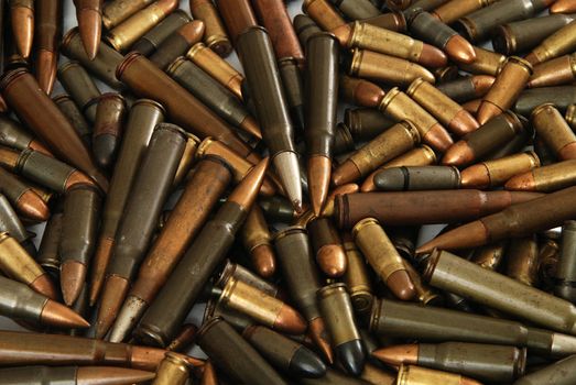 A big pile of various gun bullets 