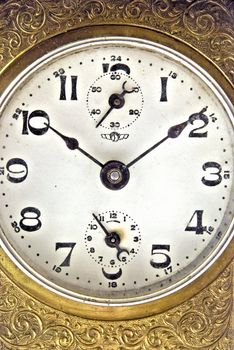 Face of the really old golden clock