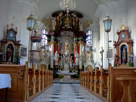           Interior of the church with altar and seats