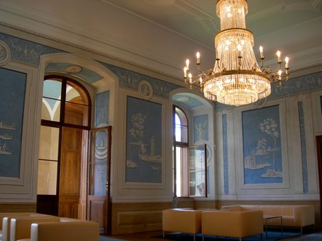 Interior of a baroque castle with beautiful chandelier          