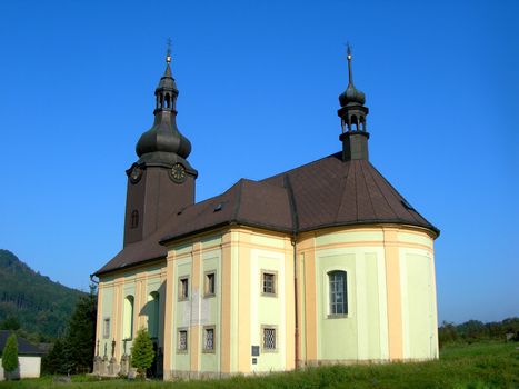           Traditional Czech baroque church located in the country. 