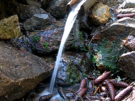        Spring water from the aquaduct manger in the mountains   