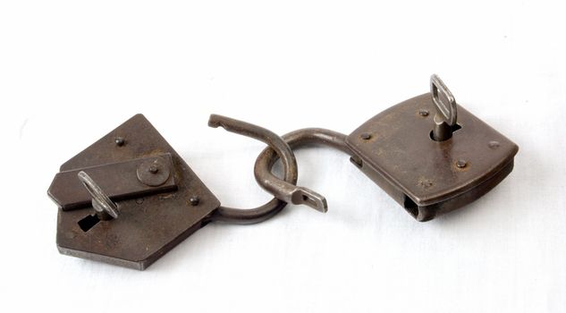 Two antique padlocks with keys