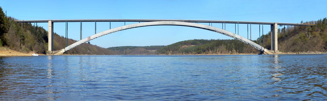 Bridge over Moldaur. Massive steel construction with a long arch.
