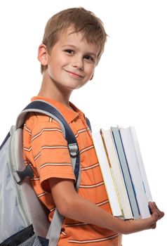 Boy holding books isolated on a white background