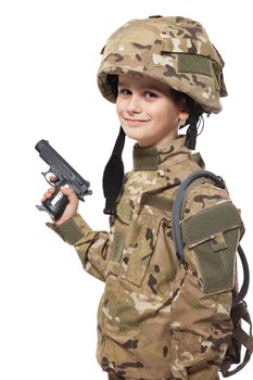 Young boy dressed like a soldier with rifle isolated on white