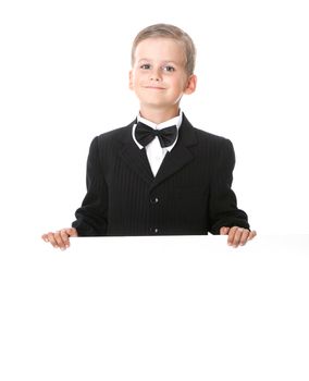 Boy holding a banner isolated on white background