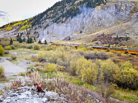 Steam Train in Rocky Mountain high country in Fall Colorado USA
