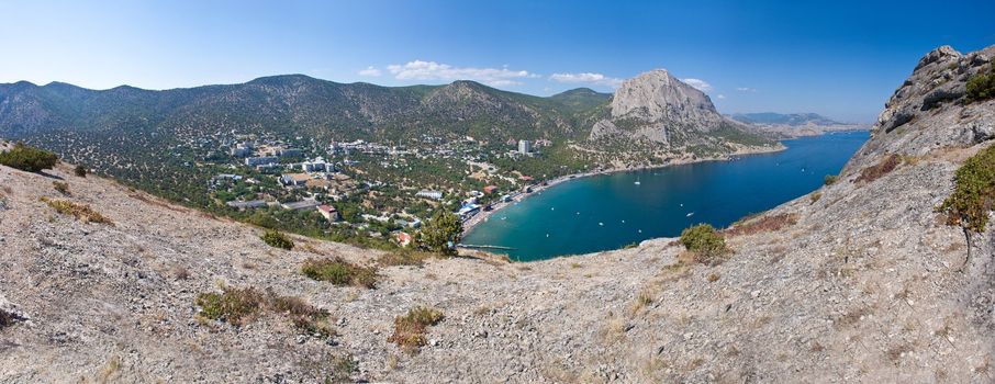 Summer view seacoast. Warm sea and beautiful nature. Sudak beach. Black Sea, Ukraine