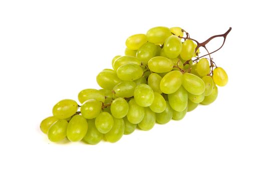 A shot of a bunch of green grapes, laying and isolated on white.