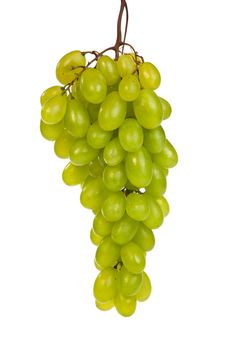 A shot of a bunch of green grapes, laying and isolated on white.