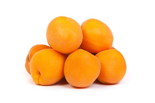 Apricots. Group of ripe apricots isolated on white background