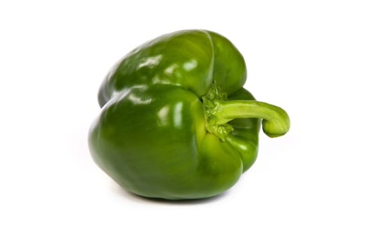 A green sweet bell pepper isolated on plain white background.