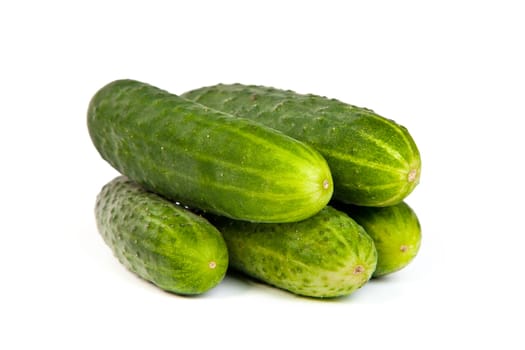 Five Fresh Cucumbers isolated on a white background