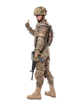 Modern soldier with rifle isolated on a white background