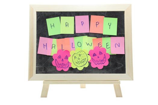 Happy halloween made from memo stick paper craft on blackboard