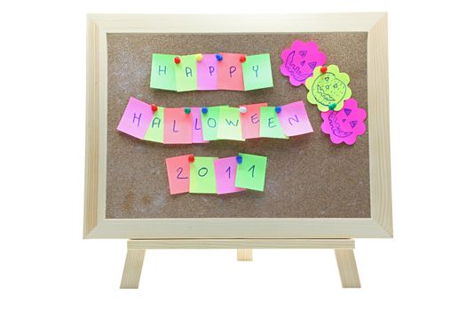 Happy halloween made from memo stick paper craft on corkboard