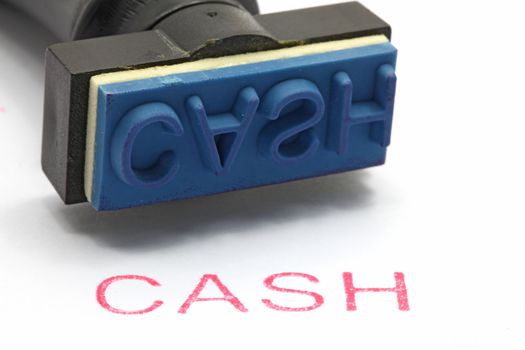 closeup of cash letter on rubber stamp isolated on white background