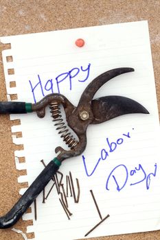 rusty scissors nails and with paper attach to cork board for labor day