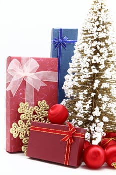set of holiday boxes with christmas tree and ornament