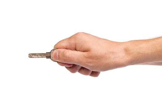 Male hand holding a key to the house, image is taken over a white background.